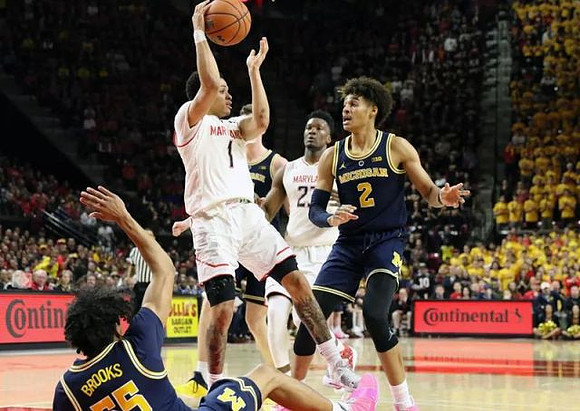 Eli Brooks (55), Jon Teske (15), and Jordan Poole (2)