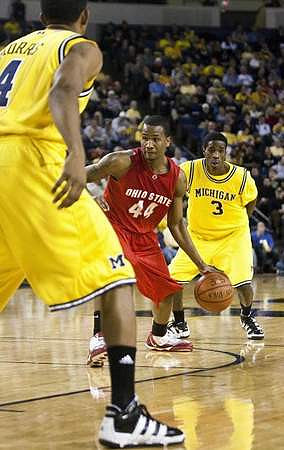 Darius Morris (4) and Manny Harris (3)