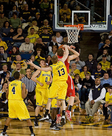 Darius Morris (4), Zack Novak (0), and Matt Vogrich (13)