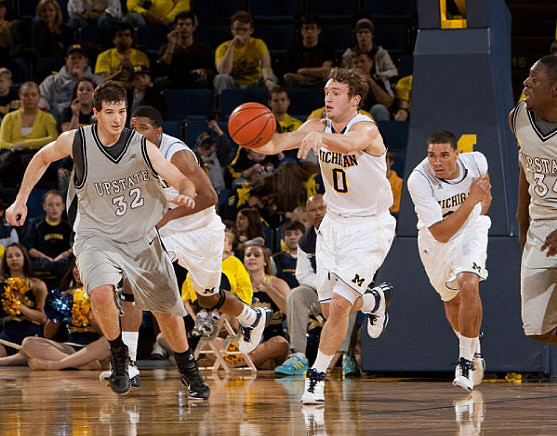 Darius Morris (4), Zack Novak (0), and Colton Christian (45)