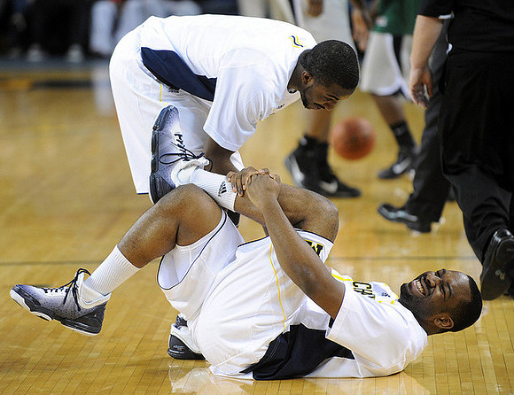 Corey Person (32) and Eso Akunne (5)