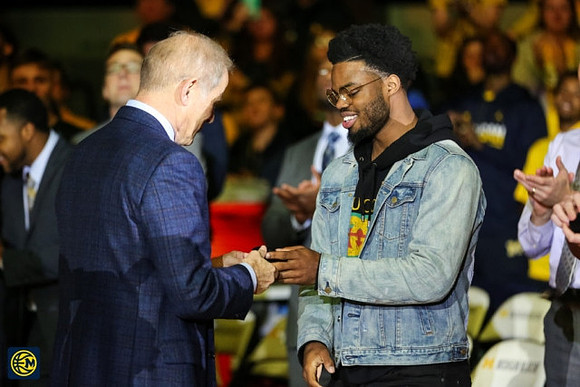 John Beilein and Derrick Walton Jr.