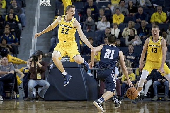 Duncan Robinson (22) and Moritz Wagner (13)