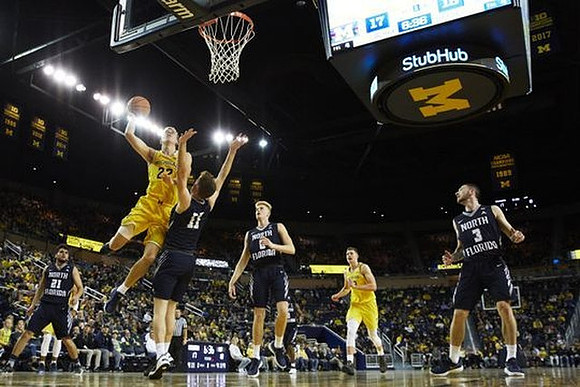 Duncan Robinson (22) and Moritz Wagner (13)