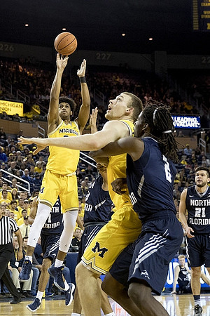 Ibi Watson (23) and Austin Davis (51)