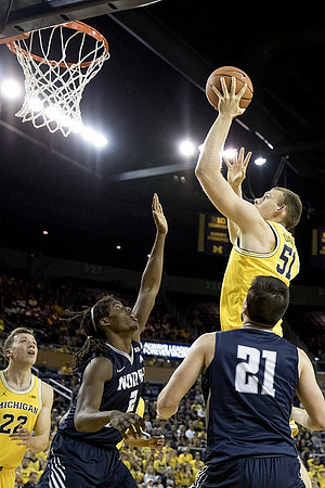 Duncan Robinson (22) and Austin Davis (51)