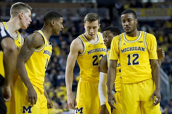 Austin Davis (51), Charles Matthews (1), Duncan Robinson (22), Zavier Simpson (3), and Muhammad-Ali Abdur-Rahkman (12)