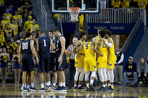 Jaaron Simmons (5) and Ibi Watson (23)