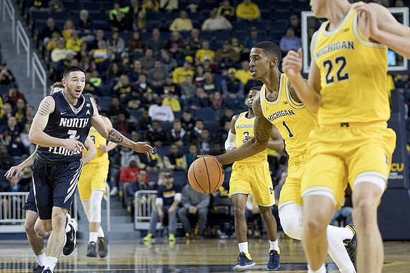 Zavier Simpson (3), Charles Matthews (1), and Duncan Robinson (22)