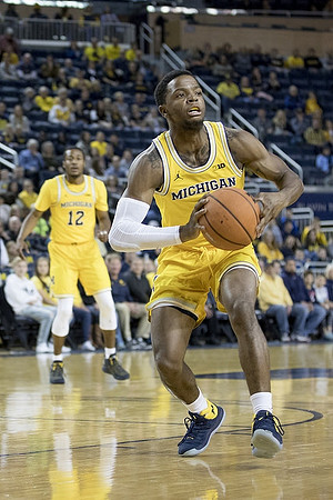 Zavier Simpson (3) and Muhammad-Ali Abdur-Rahkman (12)