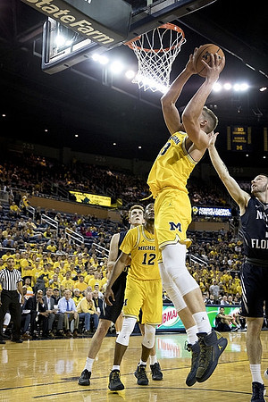 Moritz Wagner (13) and Muhammad-Ali Abdur-Rahkman (12)