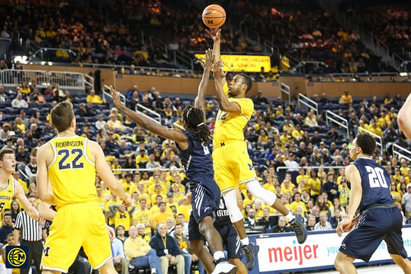 Duncan Robinson (22) and Muhammad-Ali Abdur-Rahkman (12)