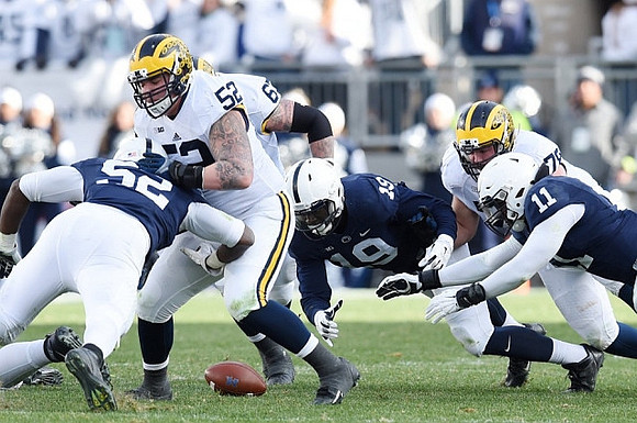 Mason Cole (52), Kyle Kalis (67), and Erik Magnuson (78)