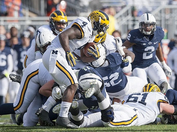 De'Veon Smith (4) and Graham Glasgow (61)