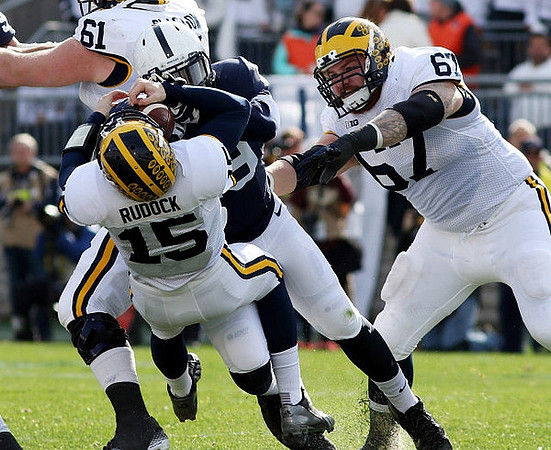 Jake Rudock (15), Graham Glasgow (61), and Kyle Kalis (67)