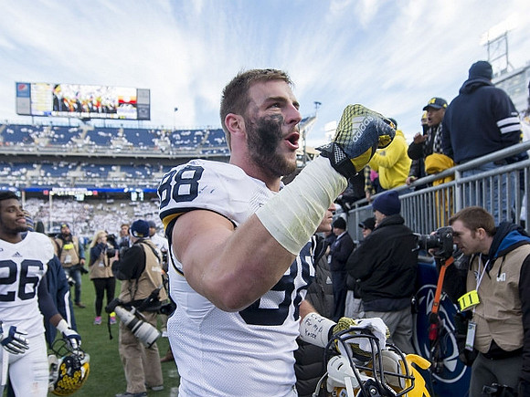 Jourdan Lewis (26) and Jake Butt (88)