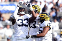 Taco Charlton (33), Chris Wormley (43), and James Ross (15)