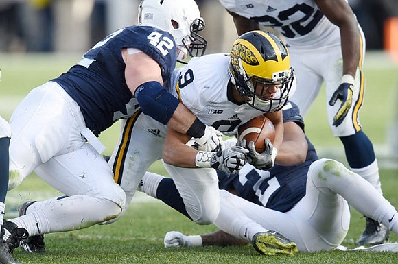 Grant Perry (9) and Amara Darboh (82)
