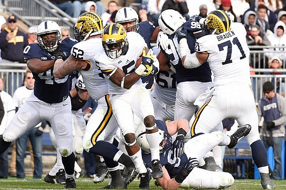 Mason Cole (52), Jabrill Peppers (5), Graham Glasgow (61), and Ben Braden (71)