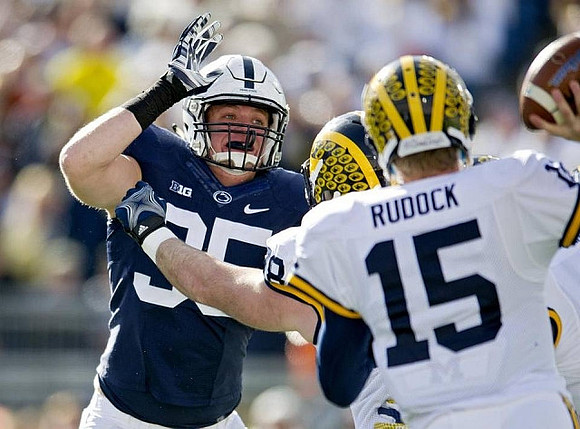 Jake Butt (88) and Jake Rudock (15)
