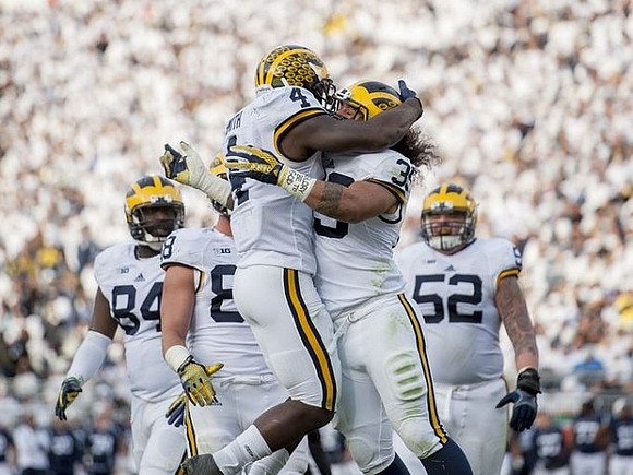 A.J. Williams (84), Jake Butt (88), De'Veon Smith (4), Sione Houma (39), and Mason Cole (52)