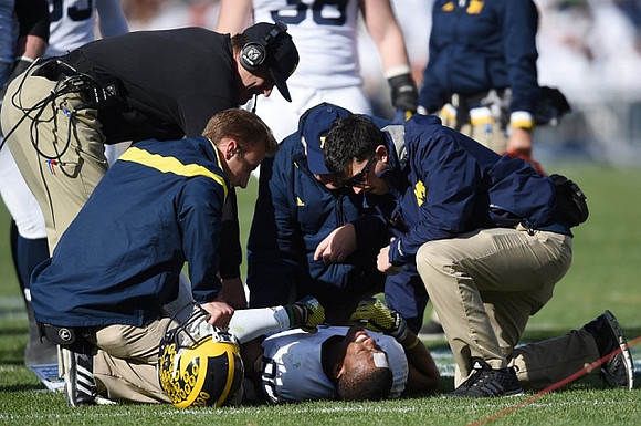 Jim Harbaugh and Jehu Chesson (86)