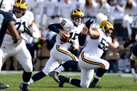 Ben Braden (71), Jake Rudock (15), and Mason Cole (52)
