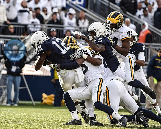 Jourdan Lewis (26) and Delano Hill (44)