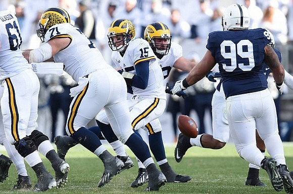 Graham Glasgow (61), Ben Braden (71), Jake Rudock (15), and Erik Magnuson (78)