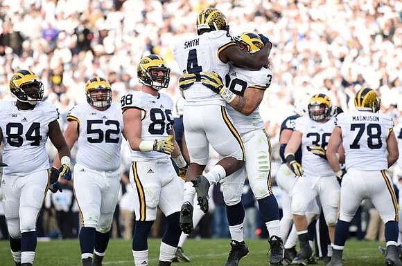 A.J. Williams (84), Mason Cole (52), Jake Butt (88), De'Veon Smith (4), Sione Houma (39), Joe Kerridge (36), and Erik Magnuson (78)