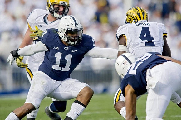Jake Butt (88) and De'Veon Smith (4)