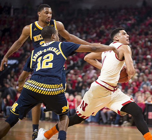 Muhammad-Ali Abdur-Rahkman (12) and Zak Irvin (21)