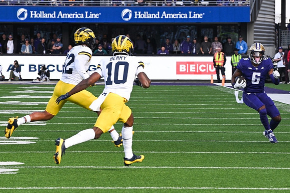TJ Guy (42) and Zeke Berry (10)