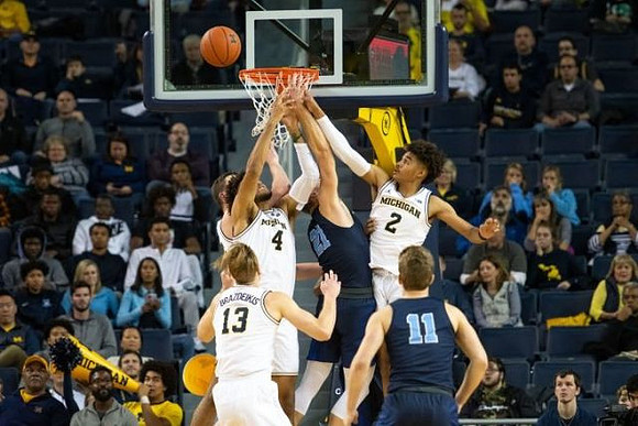 Ignas Brazdeikis (13), Isaiah Livers (4), and Jordan Poole (2)