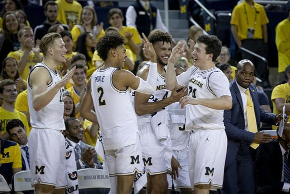 Ignas Brazdeikis (13), Jordan Poole (2), Isaiah Livers (4), C.J. Baird (24), and Deandre Haynes