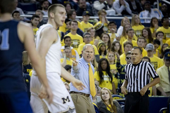 Austin Davis (51) and John Beilein