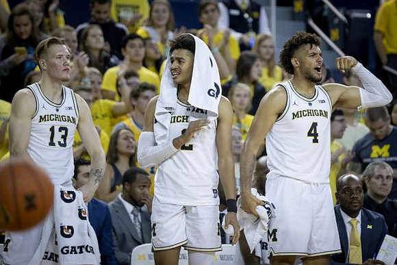 Ignas Brazdeikis (13), Jordan Poole (2), and Isaiah Livers (4)