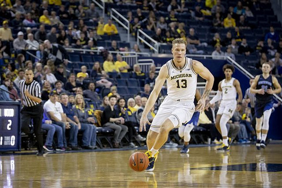 Ignas Brazdeikis (13) and Jordan Poole (2)