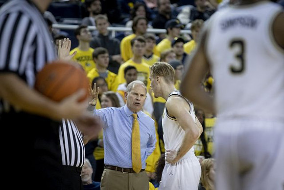 John Beilein and Ignas Brazdeikis (13)