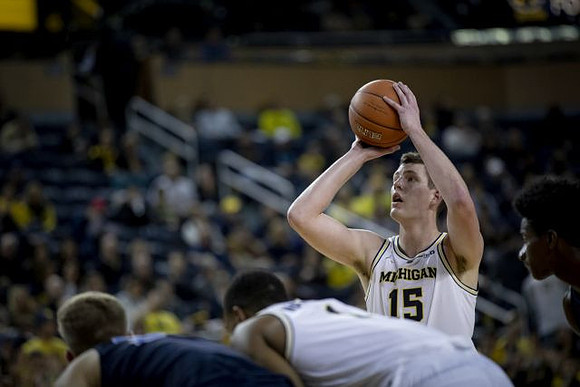 Jon Teske (15) and Charles Matthews (1)