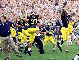 Brady Hoke, Todd Mossa (69), Kurt Anderson (37), Tate Schanski (42), and David Terrell (1)