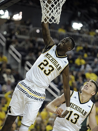Caris LeVert (23) and Moritz Wagner (13)