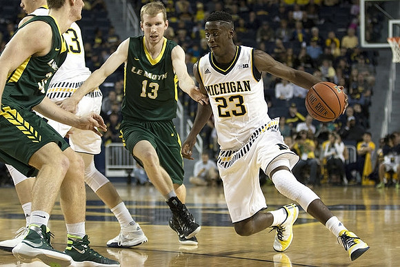 Moritz Wagner (13) and Caris LeVert (23)