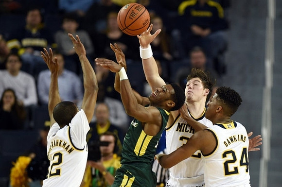 Muhammad-Ali Abdur-Rahkman (12), Ricky Doyle (32), and Aubrey Dawkins (24)