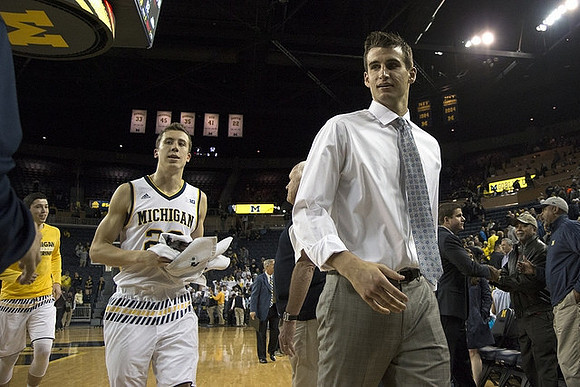 Sean Lonergan (20), Duncan Robinson (22), and Austin Hatch