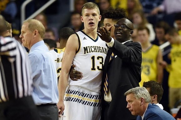 John Beilein, Moritz Wagner (13), Bacari Alexander, and Jeff Meyer