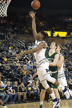 Aubrey Dawkins (24) and Spike Albrecht (2)