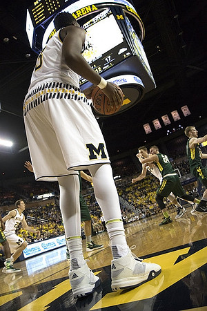 Kameron Chatman (3), Duncan Robinson (22), and Mark Donnal (34)