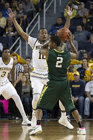 Kameron Chatman (3) and Muhammad-Ali Abdur-Rahkman (12)