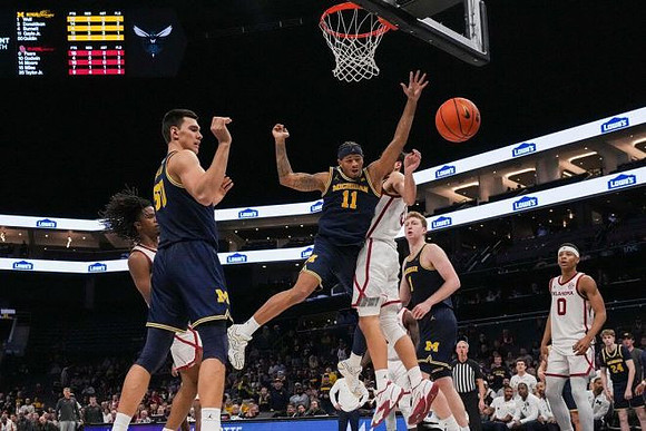 Vladislav Goldin (50), Roddy Gayle Jr. (11), and Sam Walters (24)